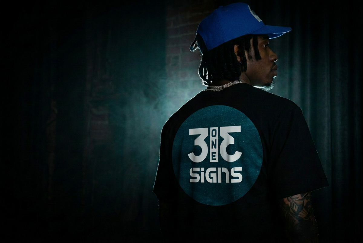313 Signs shirt logo with a royal blue hat